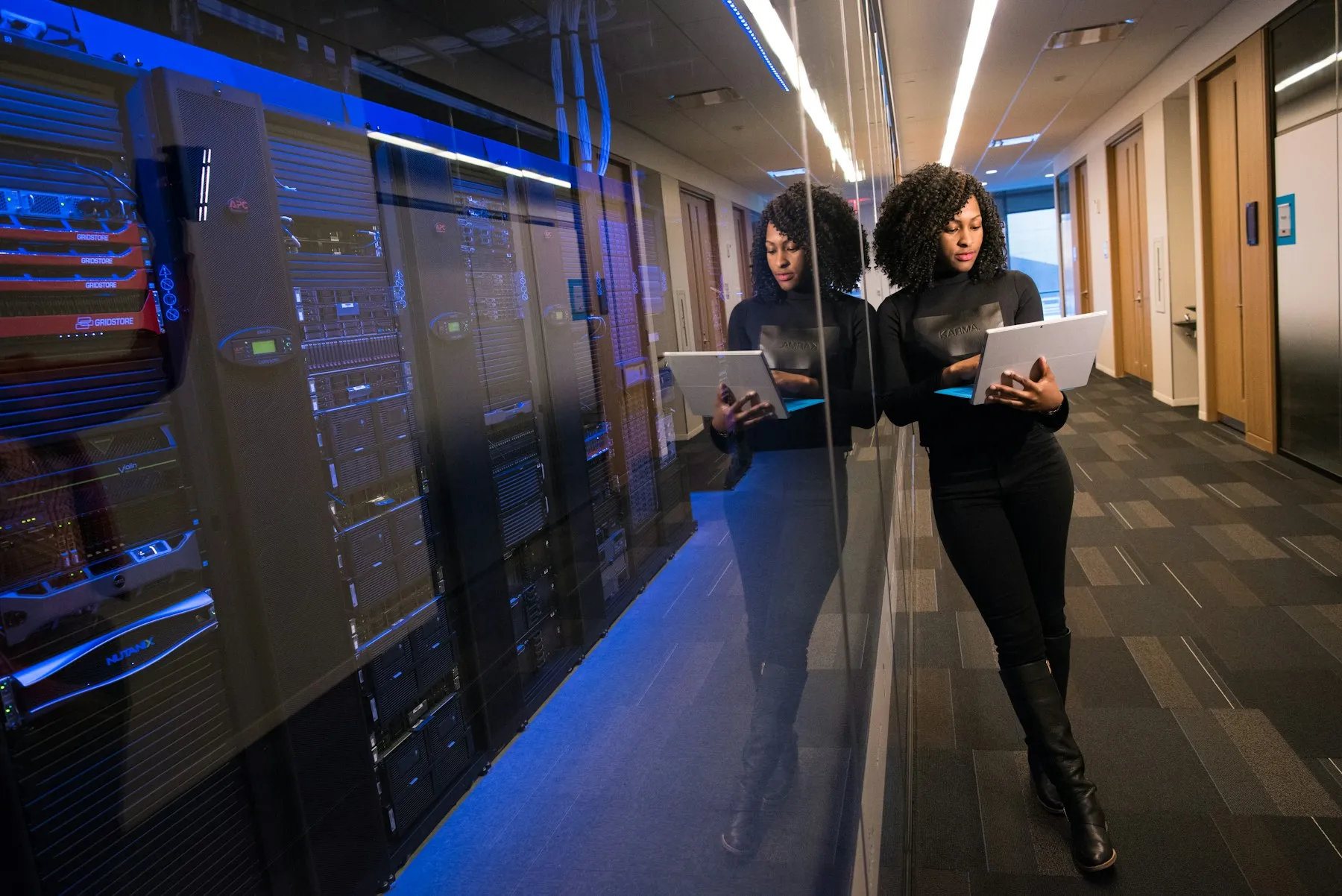 A technology professional working beside secure infrastructure